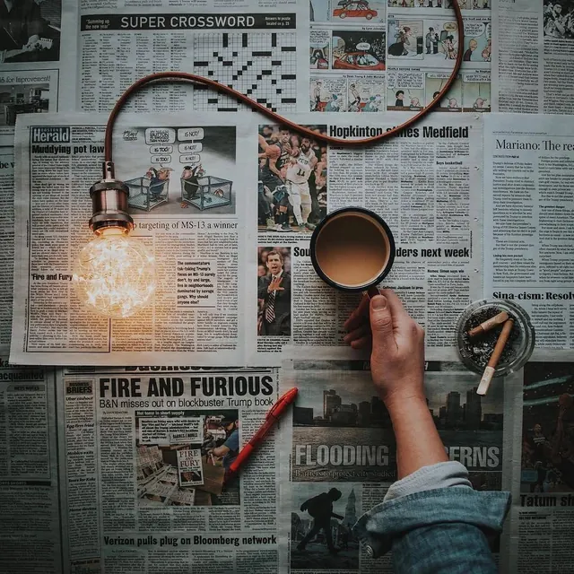 Newspaper Collage with Lightbulb and Coffee, retro, editorial, muted