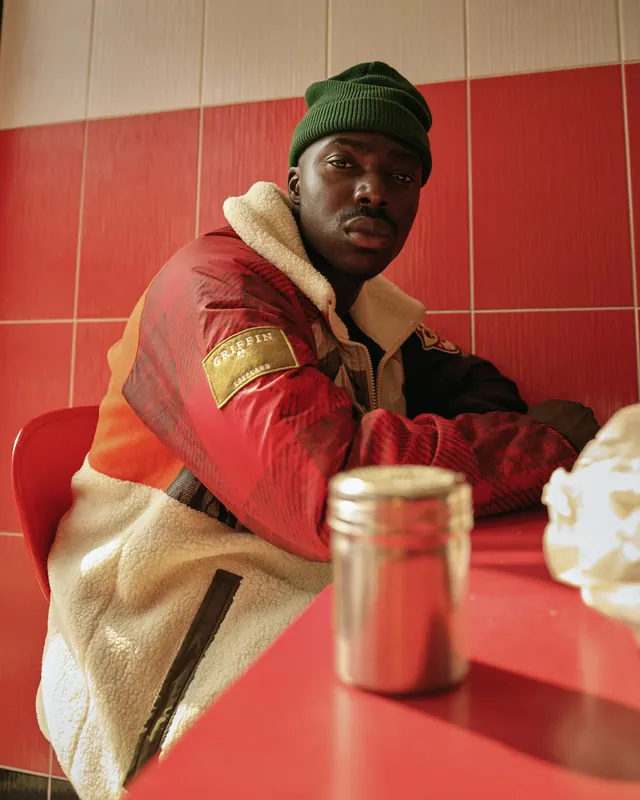 Man in Red and Gold Jacket, photographic, vibrant