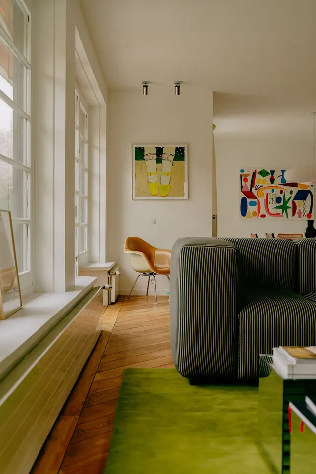 Minimalist interior with warm earth tones and abstract art, photographic, organic, warm