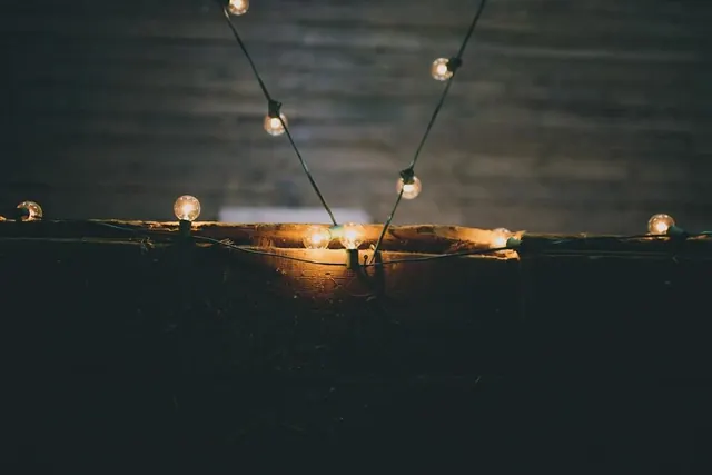 String of Glowing Lights, photographic, dark-mode, dark