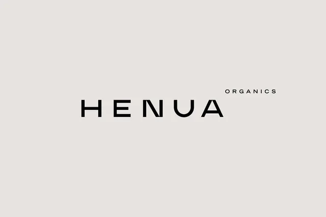 HENUA ORGANICS: monochrome wordmark with geometric sunburst, minimal, technical, monochrome