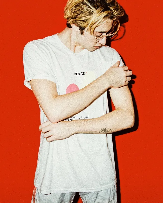 Portrait of a Man in a White T-Shirt, photographic, minimal, vibrant