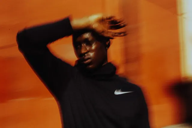 Motion Blur Portrait with Nike Branding, photographic, abstract, warm