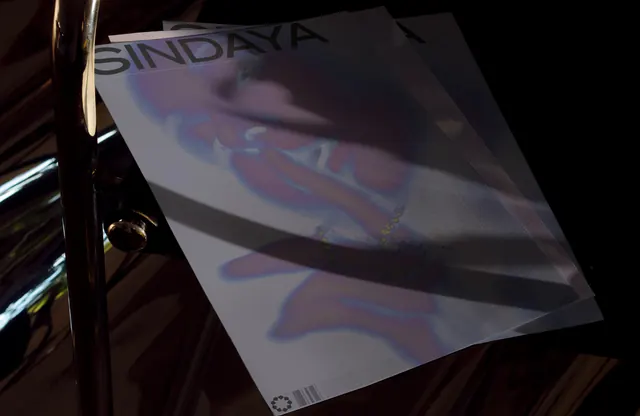 Sindaya iridescent print stack, editorial, minimal, dark