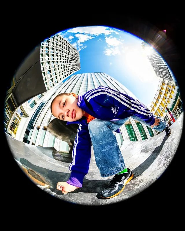 Child in Blue Jacket Sphere, photographic, playful, vibrant