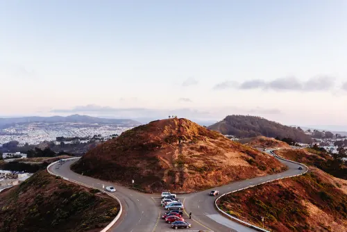 Aerial View of Coastal Road and Hills, photographic, organic, earthy