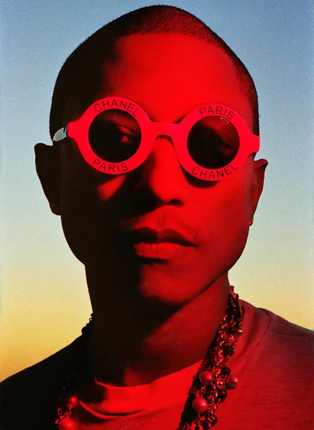Portrait of Person in Red Sunglasses, photographic, vibrant