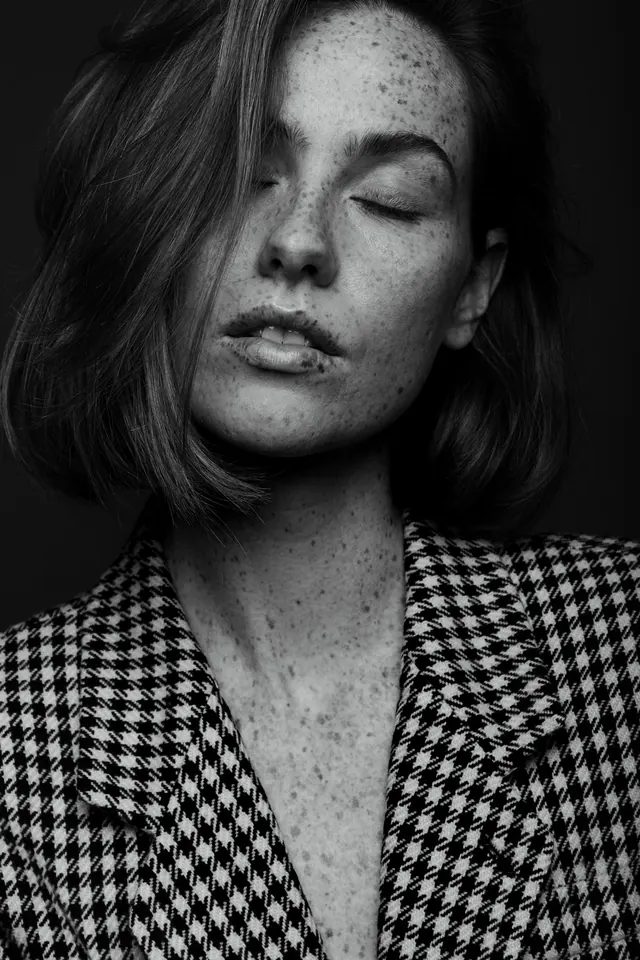 Close-up Portrait with Patterned Clothing, monochrome, photographic, monochrome