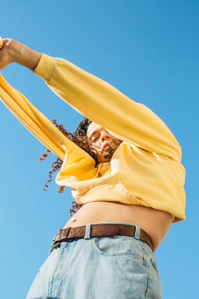 Woman in Yellow Sweater Collage, playful, maximalist, vibrant
