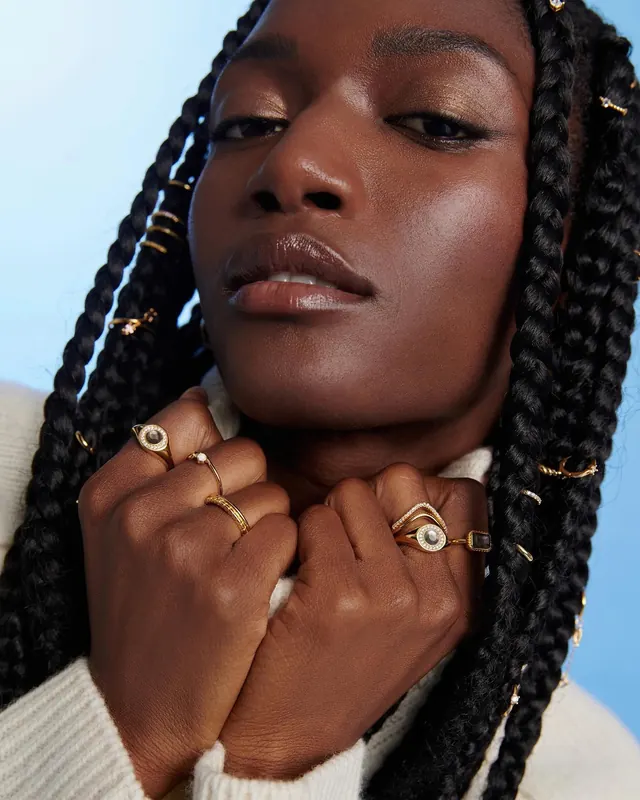 Portrait of a Woman with Gold Jewelry, photographic, luxury, warm