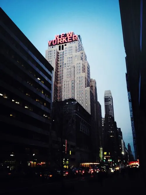 Marriott Hotel Building at Night, photographic, corporate-clean, dark