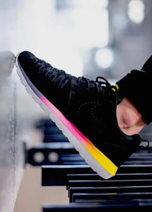 Sneaker Close-up with Piano Keys, photographic, dark