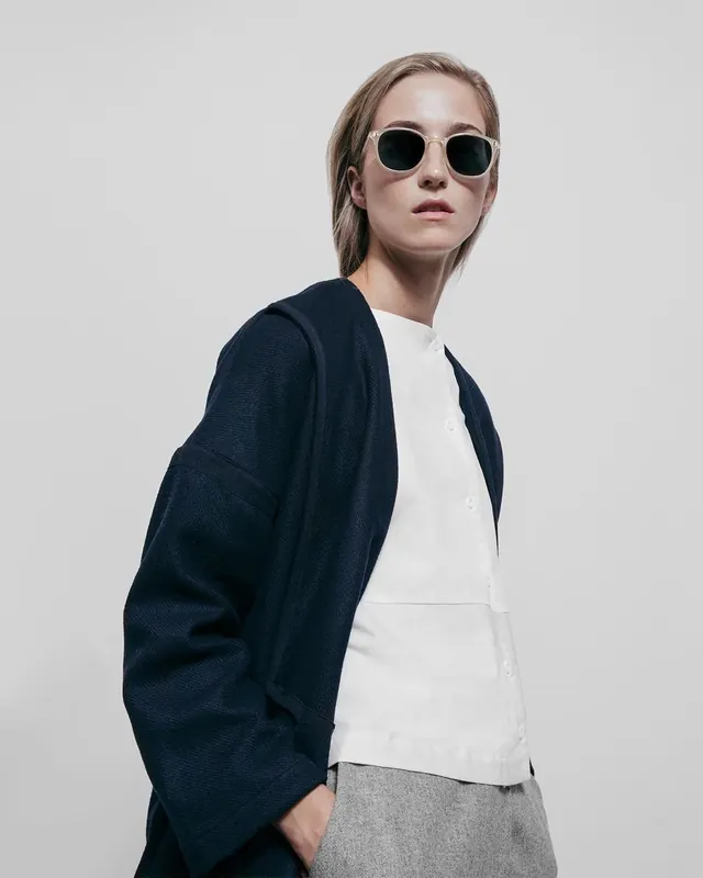 Fashion Portrait with Sunglasses, minimal, photographic, high-contrast