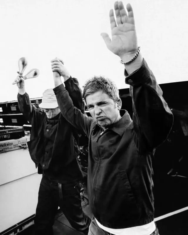 Black and White Portrait of Men with Raised Hands, monochrome, photographic, monochrome