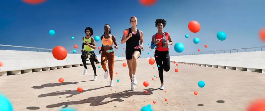 Group of Athletes in a Sand Pit, photographic, playful, vibrant