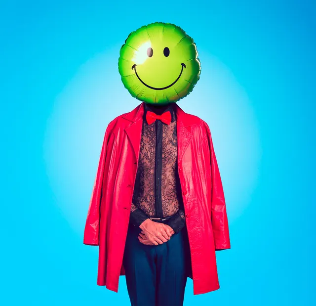 Smiley Face Character in Red Coat, playful, y2k, vibrant