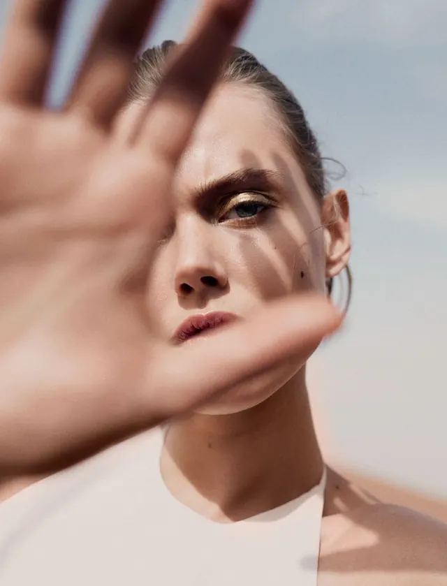 Close-up Portrait with Hand Overlay, photographic, minimal, light