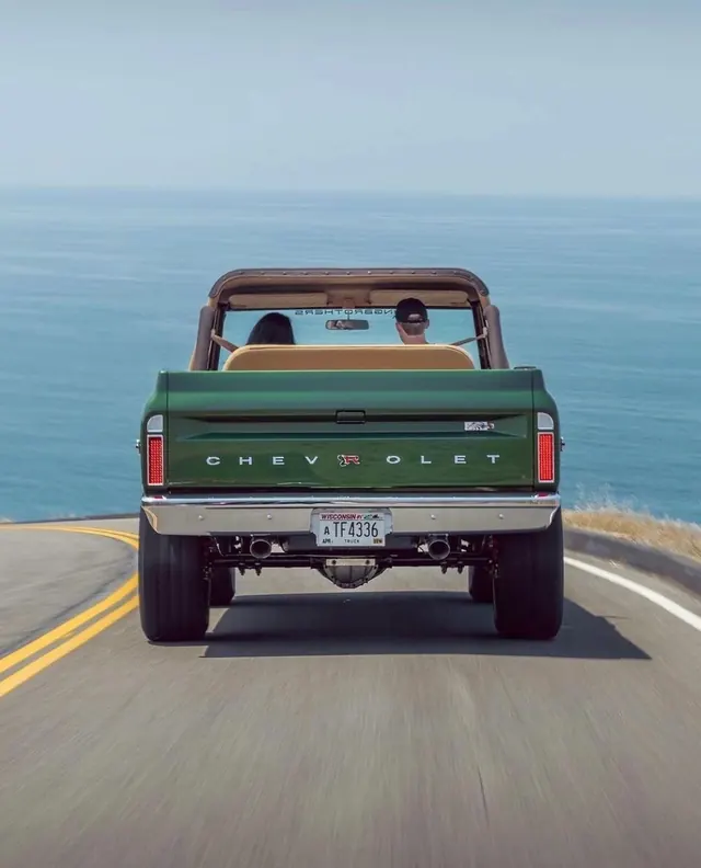 Vintage Pickup Truck on Coastal Road, retro, photographic, vibrant