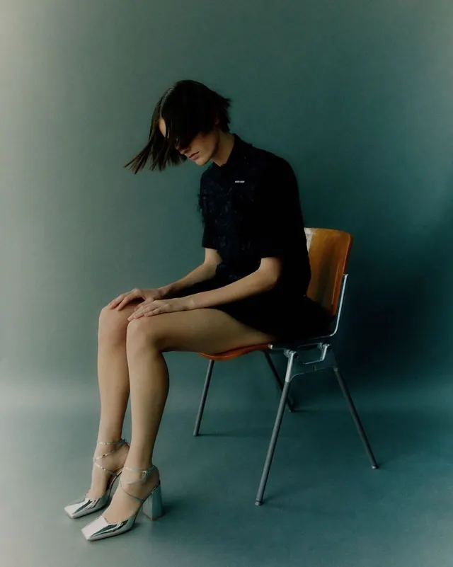 Woman in Black Dress Sitting on Chair, minimal, photographic, cool