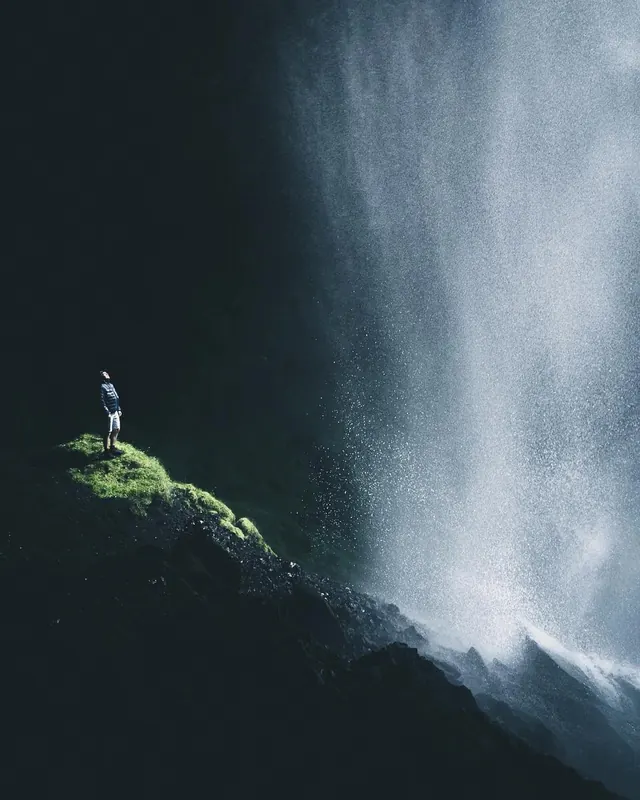 Person Standing Before Waterfall, minimal, photographic, dark