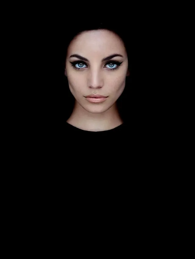 Portrait of a Woman with Heavy Eyeliner, photographic, dark-mode, dark