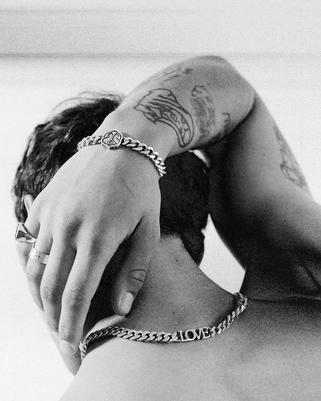 Tattooed Man with Chain Jewelry, monochrome, photographic, monochrome