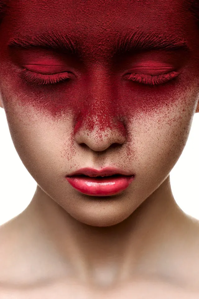 Red Splatter Face Portrait, photographic, organic, high-contrast