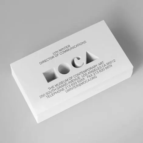 Museum business card with embossed geometric mark, minimal, swiss, monochrome