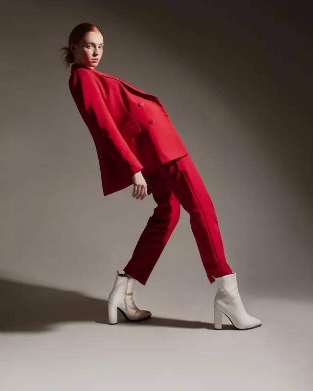 Woman in Red Blazer and Trousers, photographic, luxury, vibrant