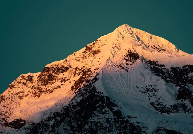 Snow-Capped Mountain Peak at Dusk, photographic, organic, high-contrast