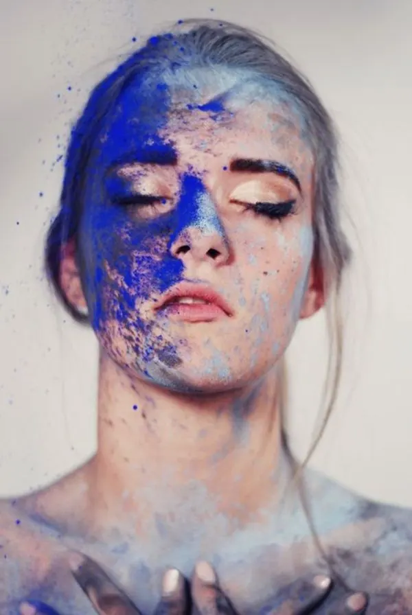 Abstract Portrait with Blue Powder, organic, photographic, high-contrast
