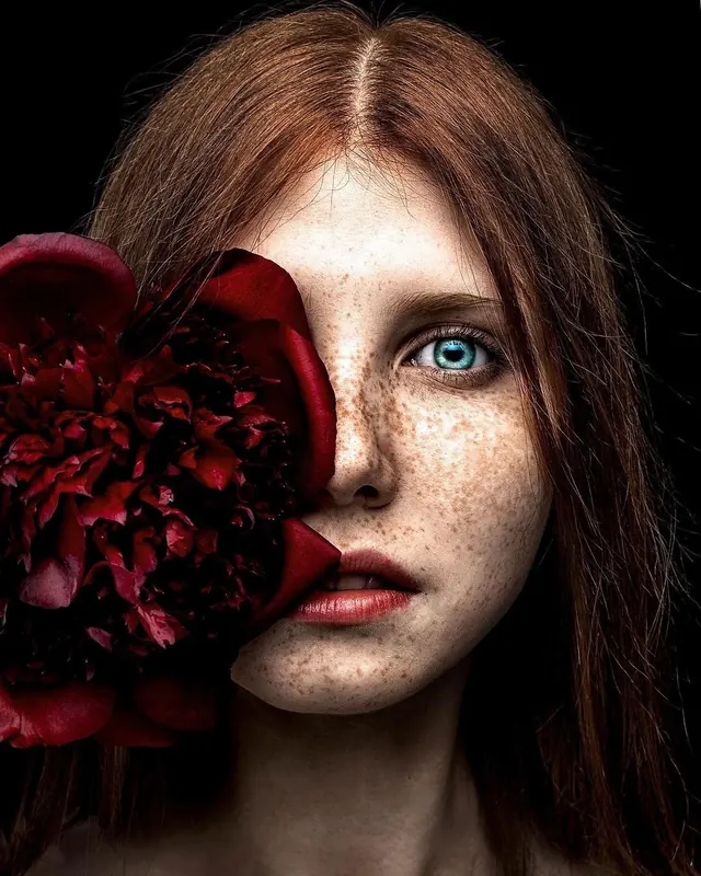 Portrait of a Woman with Red Flower, photographic, organic, dark