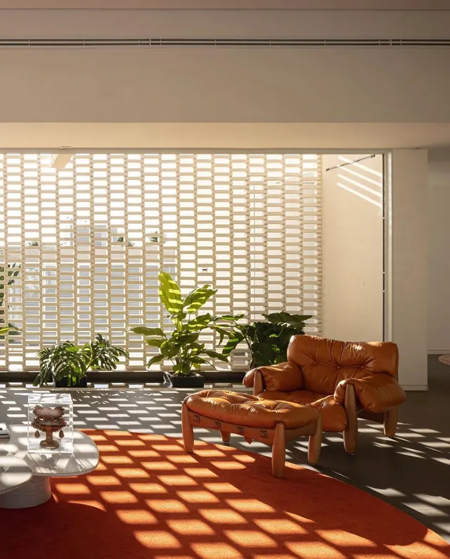 Modern Interior with Sunlit Courtyard, minimal, photographic, warm
