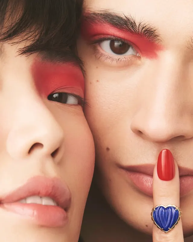 Close-up Portrait with Red Eye Makeup, editorial, photographic, vibrant