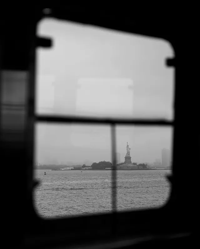 Window View of a Coastal Landmark, minimal, photographic, monochrome