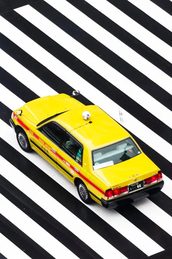 Yellow Taxi on Diagonal Stripes, flat, geometric, high-contrast