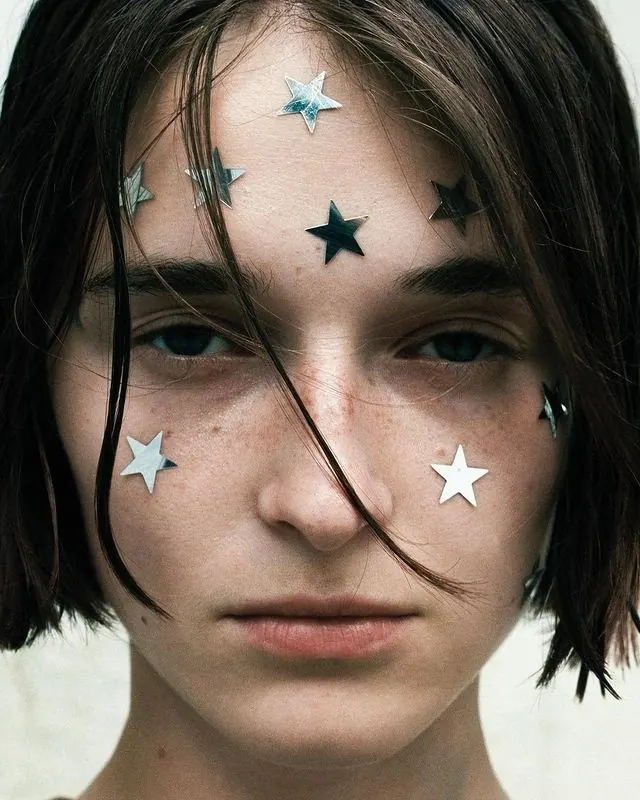 Portrait with Star Face Paint, photographic, organic, dark