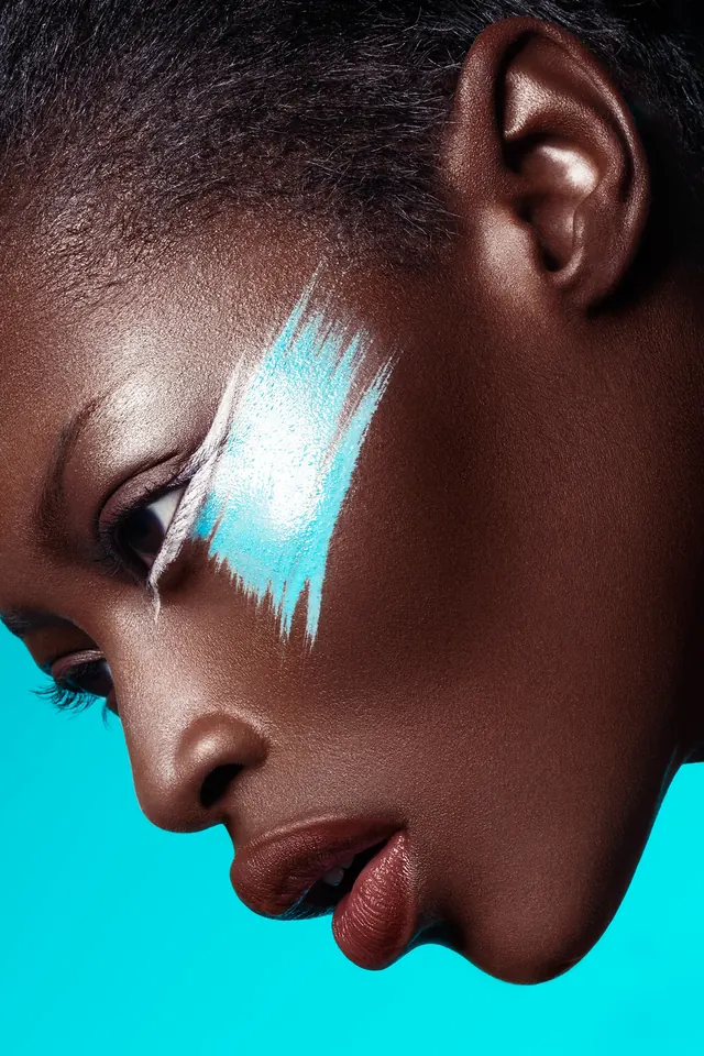 Portrait with Blue Face Paint, photographic, organic, high-contrast