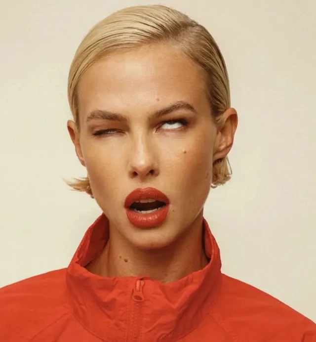 High-Fashion Portrait with Red Accents, editorial, luxury, vibrant