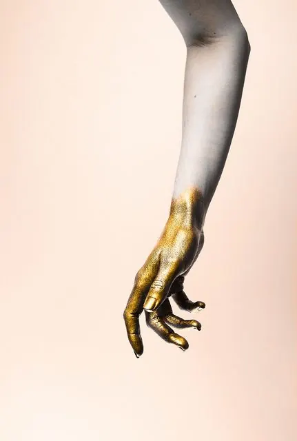 Gold Leaf Hand Photograph, minimal, luxury, light