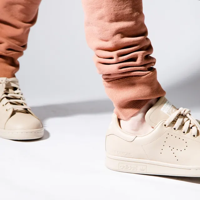 Sneaker and Sweatpants Close-up, minimal, photographic, muted