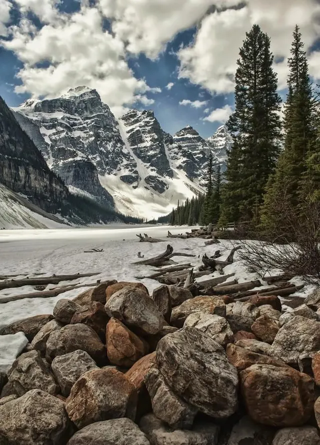 Snowy Mountain Landscape with Foreground Rocks, photographic, organic, cool