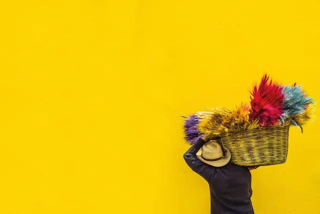 Hand Holding Basket of Flowers, playful, organic, vibrant