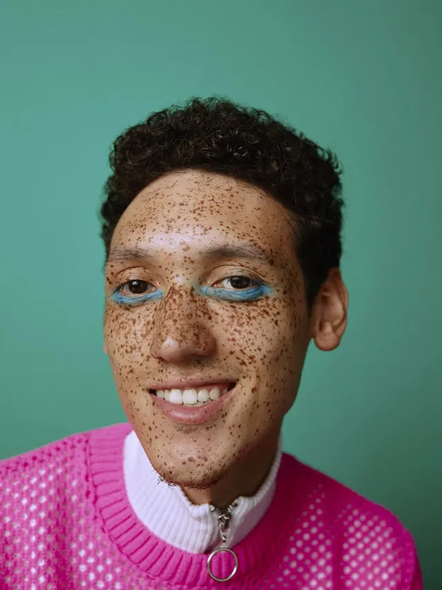 Portrait of a Man with Freckles and Blue Eyes, photographic, organic, vibrant