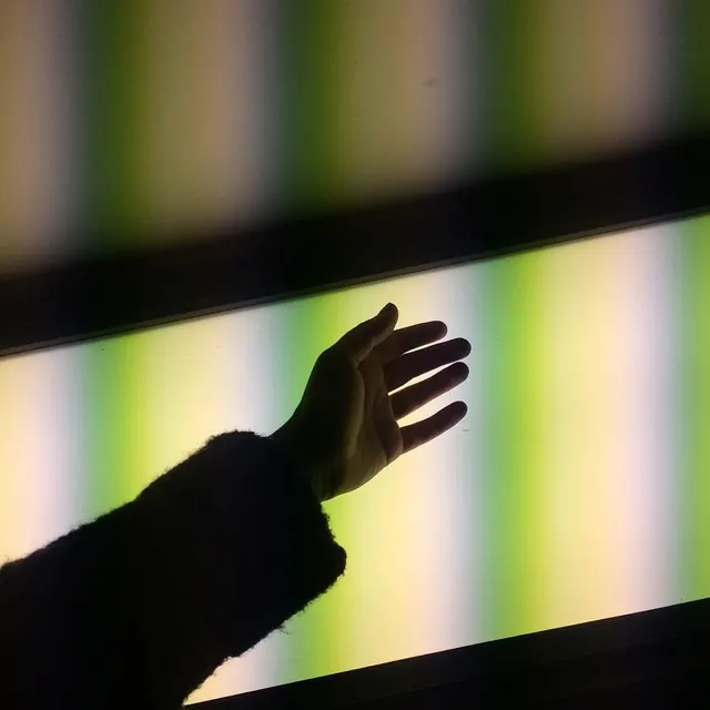 Silhouette Hand Against Striped Background, minimal, abstract, vibrant