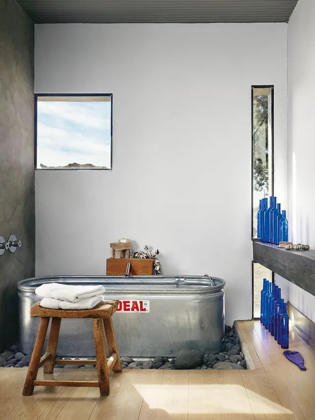 Industrial Interior with Bathtub and Blue Accents, minimal, photographic, light
