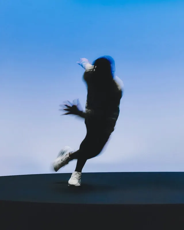 Abstract Humanoid Figure in Blue Space, minimal, abstract, high-contrast