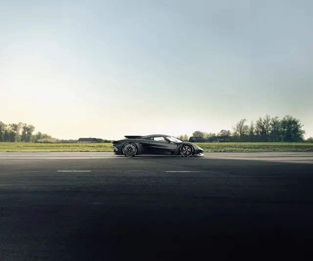 Sports Car on Open Road, minimal, photographic, monochrome
