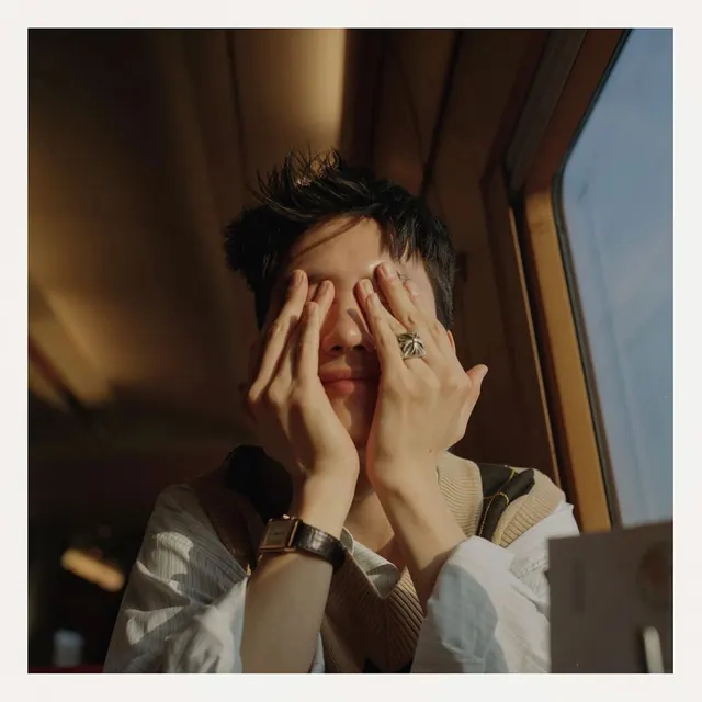 Portrait of a Man with Hands Over Face, photographic, organic, warm