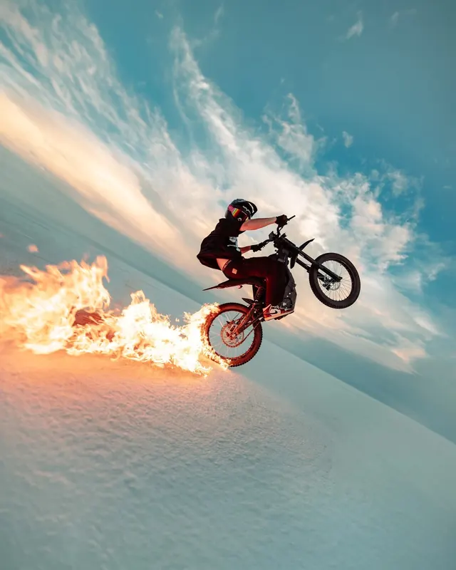Motorcyclist Performing a Wheelie, photographic, vibrant